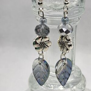 Handmade silver and blue-gray glass leaves.